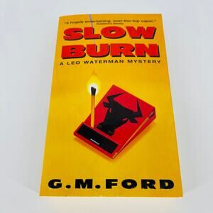 Slow Burn, a paperback book / novel by G.M. Ford - Good Used Condition